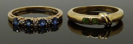 A 9ct gold ring set with peridot and a 9ct gold ring set with sapphires and diamonds, size N & O,