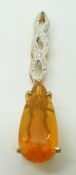A 9ct gold pendant set with a pear cut fire opal and diamonds, 4.3g