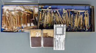 A large collection of bone and treen lace bobbins including named, inlaid and coloured examples