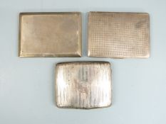Three hallmarked silver cigarette cases including an Art Deco example, weight 438g all in