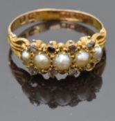 Edwardian 9ct gold ring set with split pearls and old cut diamonds, Birmingham 1901