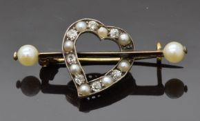 Victorian brooch in the form of a heart set with alternating diamonds and pearls with two further