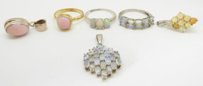 Two silver pendants set with Ethiopian opals, a silver pendant set with pink opal, silver earrings