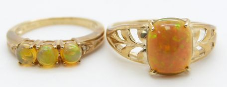 Two 9ct gold rings set with Indonesian opals, 4.6g, size S, M