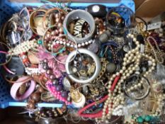 A collection of costume jewellery including beads, jewellery boxes, etc