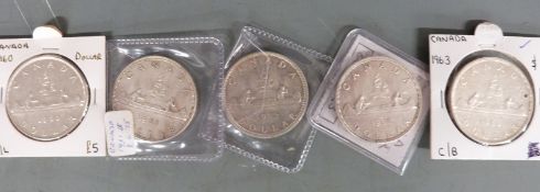 Five Canadian silver dollars 1960, 1961, 1962, 1963 and 1965