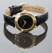 Gucci ladies wristwatch ref. 3000 with gold hands, black dial, inlaid black Roman numerals to the