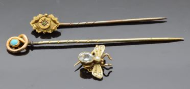 Two 9ct gold Victorian stick pins and a Victorian fly brooch/ pin set with aquamarine and seed
