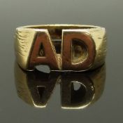 A 9ct gold ring with A D initials, size N, 8.72g