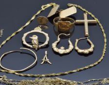 A collection of 9ct gold jewellery comprising signet ring, cross, 'A' pendant, earrings and