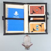 Bugatti Owner's Club car badge, height 9cm, with faux leather Bugatti glove box containing playing