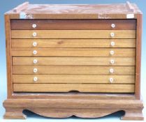 Mahogany eight drawer collector's cabinet with removable front, W46 x D36 x H35cm.