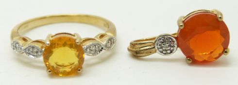 A 9ct gold ring set with a round cut fire opal and diamonds and a pendant set with a fire opal and