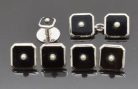 A set of 9ct white gold Art Deco buttons, a stud and a cufflink, all set with onyx and a pearl to