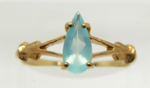 A 9ct gold ring set with a pear cut Paraiba opal, 1.7g, size N