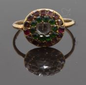 Georgian ring set with a rose cut diamond, two rubies, garnets and emeralds, size K