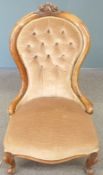19thC mahogany framed button back nursing chair raised on gnurled cabriole legs