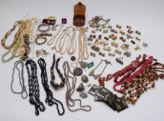 A collection of jewellery including vintage brooches, earrings including Monet, Trifari,