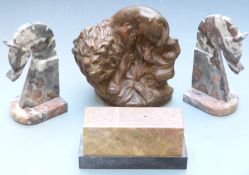 Pair of carved soapstone horse head bookends, height 20cm, terracotta figure of a lion and a