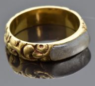Victorian mourning ring set with plaited hair in a glass compartment, with embossed foliate