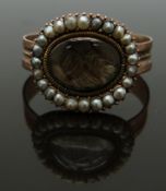 Georgian / Victorian mourning ring set with plaited hair surrounded by seed pearls, size Q/R, 3.54g