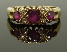 An 18ct gold ring set with rubies and diamonds, size K, 3.00g