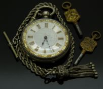 Silver open faced pocket watch with blued hands, gold Roman numerals, gilt floral decoration,