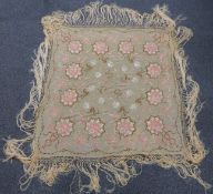 A 19th/20thC Chinese pale apricot coloured shawl with embroidered chrysanthemum decoration and
