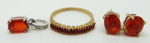 A 9ct gold ring set with Salamanca fire opals (size L/M), a 9ct white gold pendant set with a