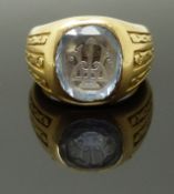 An 18ct French gold signet ring set with carved aquamarine, size O, 23.76g