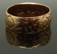 A 9ct rose gold engraved wedding band/ ring, size R, 3.7g