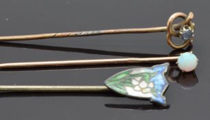 Two 9ct gold stick pins, one set with a sapphire and the other an opal together with a silver