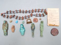 Small collection of ancient Egyptian and ancient Egyptian style items to include shabtis, scarabs,