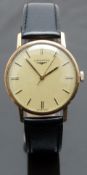 Longines 9ct gold gentleman's wristwatch ref. 17177 with gold hands and baton markers, champagne