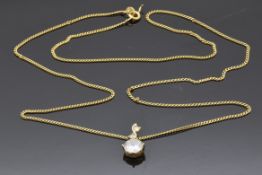 An 18ct gold chain (3.8g) and 14k gold pendant set with a mixed cut cubic zirconia