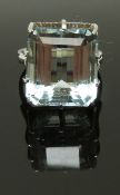An 18ct white gold ring set with an emerald cut aquamarine of approximately 25ct, size P, 9.76g