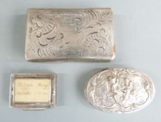 Three continental white metal snuff and trinket boxes, length of largest 7cm, weight of all three