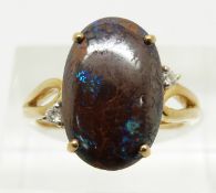 A 9ct gold ring set with a large boulder opal, 3.8g, size N