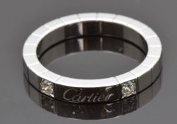 Cartier Lanieres 18ct white gold ring set with two round cut diamonds, size M/N, 6.23g