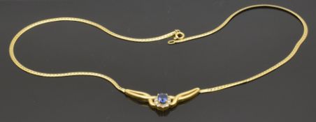 An 18ct gold necklace set with an oval cut sapphire of approximately  0.5cts and diamonds, 8.2g