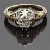 Art Deco ring set with an old cut cushion cut diamond of approximately 0.7ct in a pierced setting,