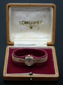 Longines 9ct gold ladies wristwatch ref. 29206 with gold hands and baton markers, silver dial and