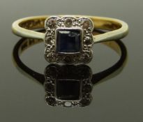 An 18ct gold and platinum ring set with a square cut sapphire and diamonds, size N, 2.74g