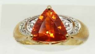 A 9ct gold ring set with a trilliant cut fire opal and diamonds, 3g, size N