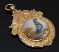 A 9ct rose gold fob set with an enamel pigeon, Birmingham 1930, 11.2g
