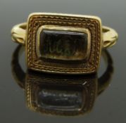 Victorian 18ct gold mourning ring set with plaited hair and wire initials to the central glass