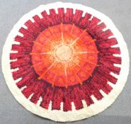 A retro 1960's/70's circular rug, diameter 200cm