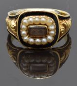 William IV mourning ring set with plaited hair to the centre surrounded by seed pearls and black