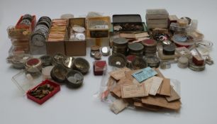A large quantity of mainly pocket watch parts and spares, many new, including glasses, crowns,