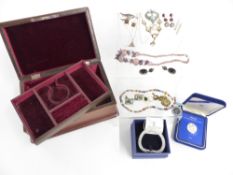 A collection of jewellery including Swarovski bracelet, silver earrings, ring, and a necklace set